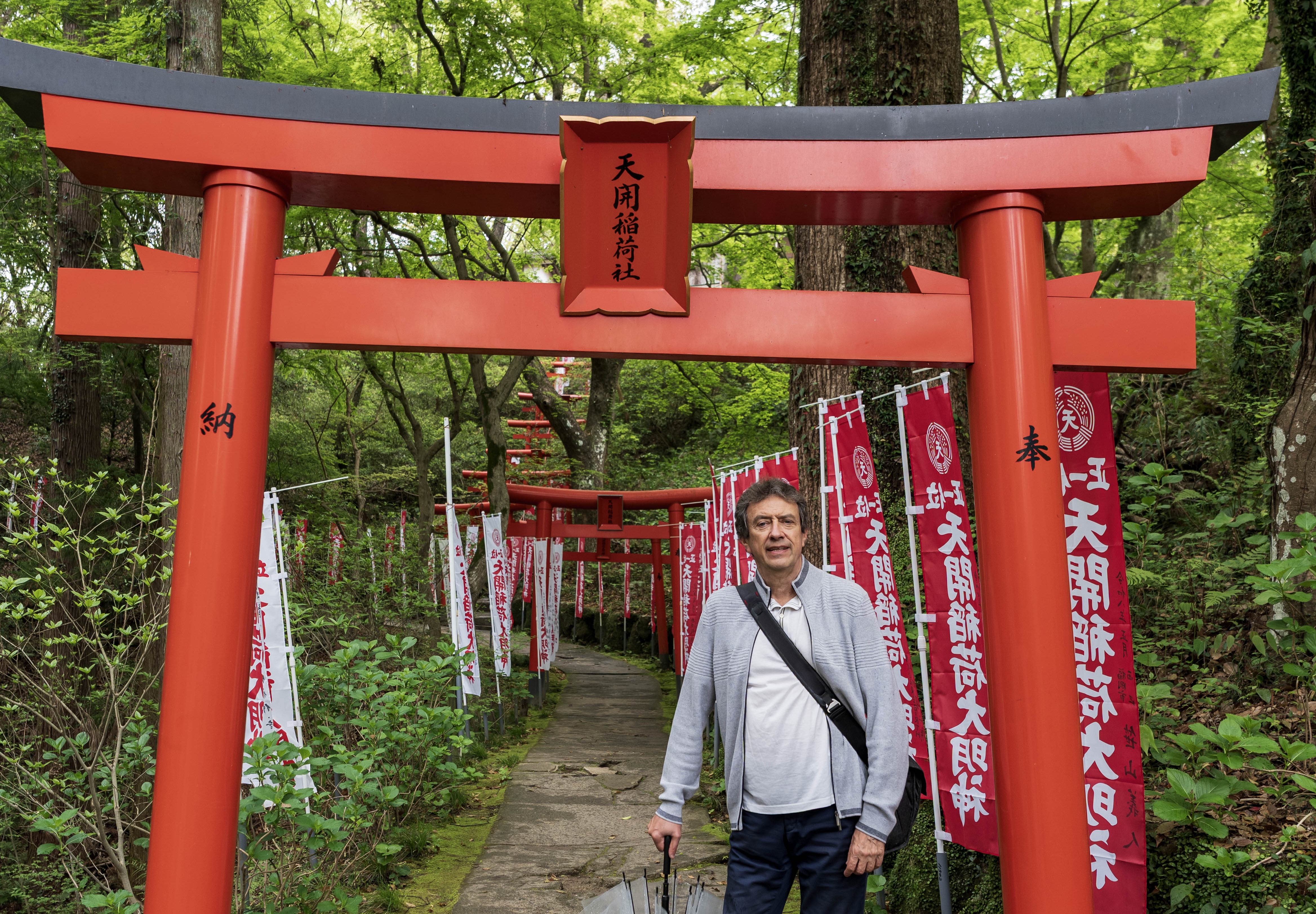 Dad standing in a torii at Dazaifu